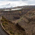 Classic Gran Canaria volcanic landscape with a road and a banana plantation