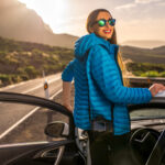 Female traveler near the car
