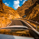 Mountain road with car reflection on western part of Gran Canaria island